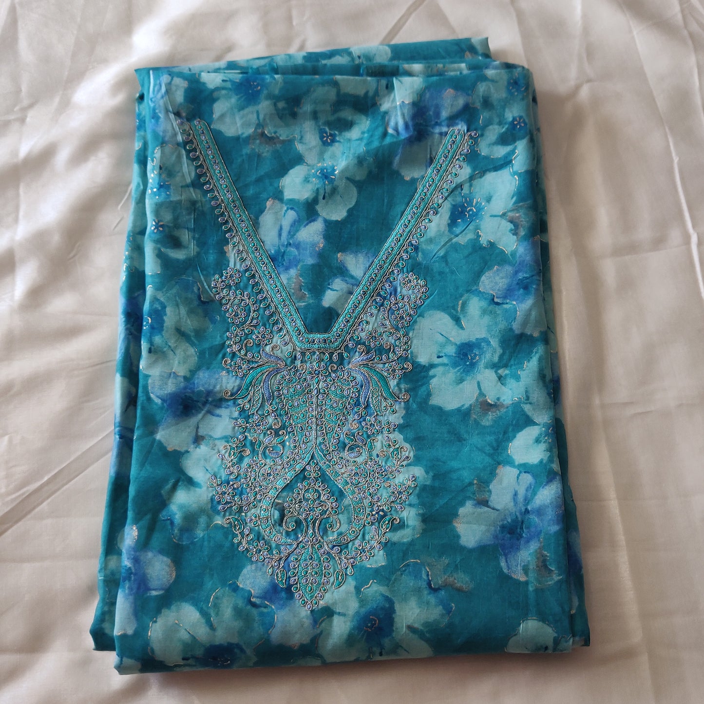 Turquoise Blue Plumeria neck embroidery unstitched suit